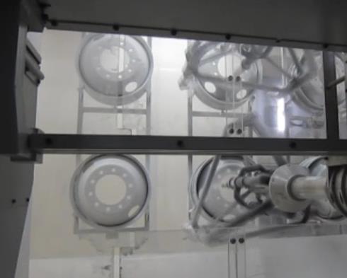 Man-machine automation steel wheel hub coating line